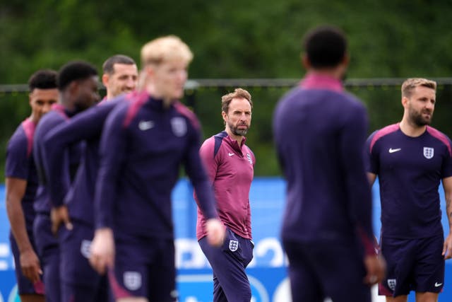 <p>England manager Gareth Southgate stands amid players at a training session
 (Adam Davy/PA)</p>