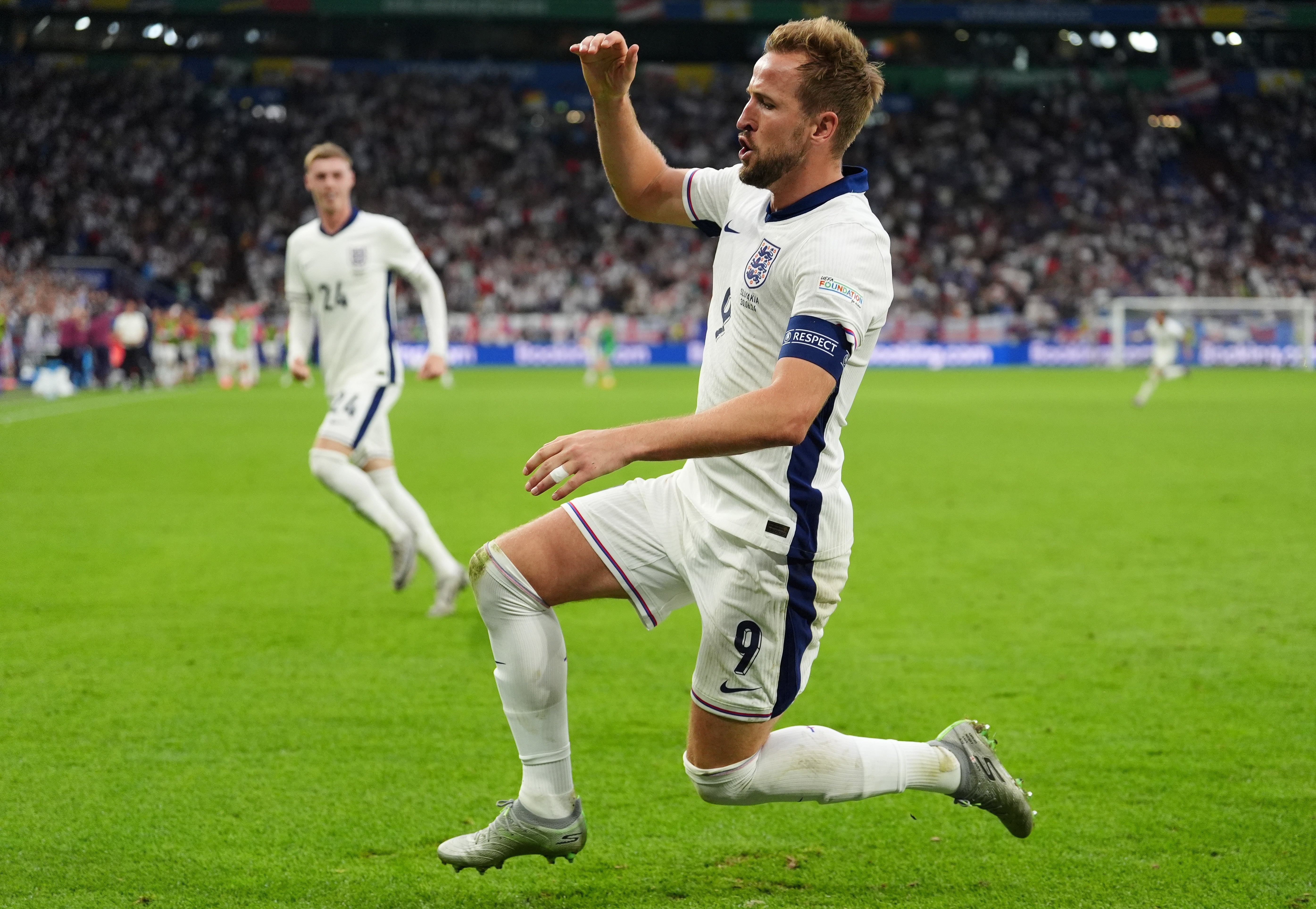 England’s Harry Kane celebrates after scoring their side’s second goal of the game during the win over Slovakia (Bradley Collyer/PA)