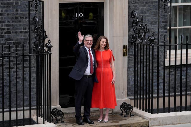 <p>Sir Keir Starmer and his wife Victoria outside No 10 Downing Street (Gareth Fuller/PA)</p>