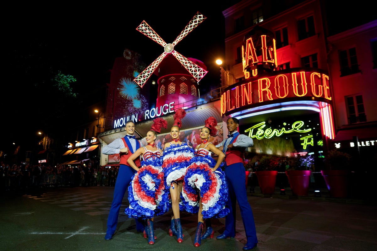 Moulin Rouge cabaret’s iconic red windmill restored after collapsing earlier this year