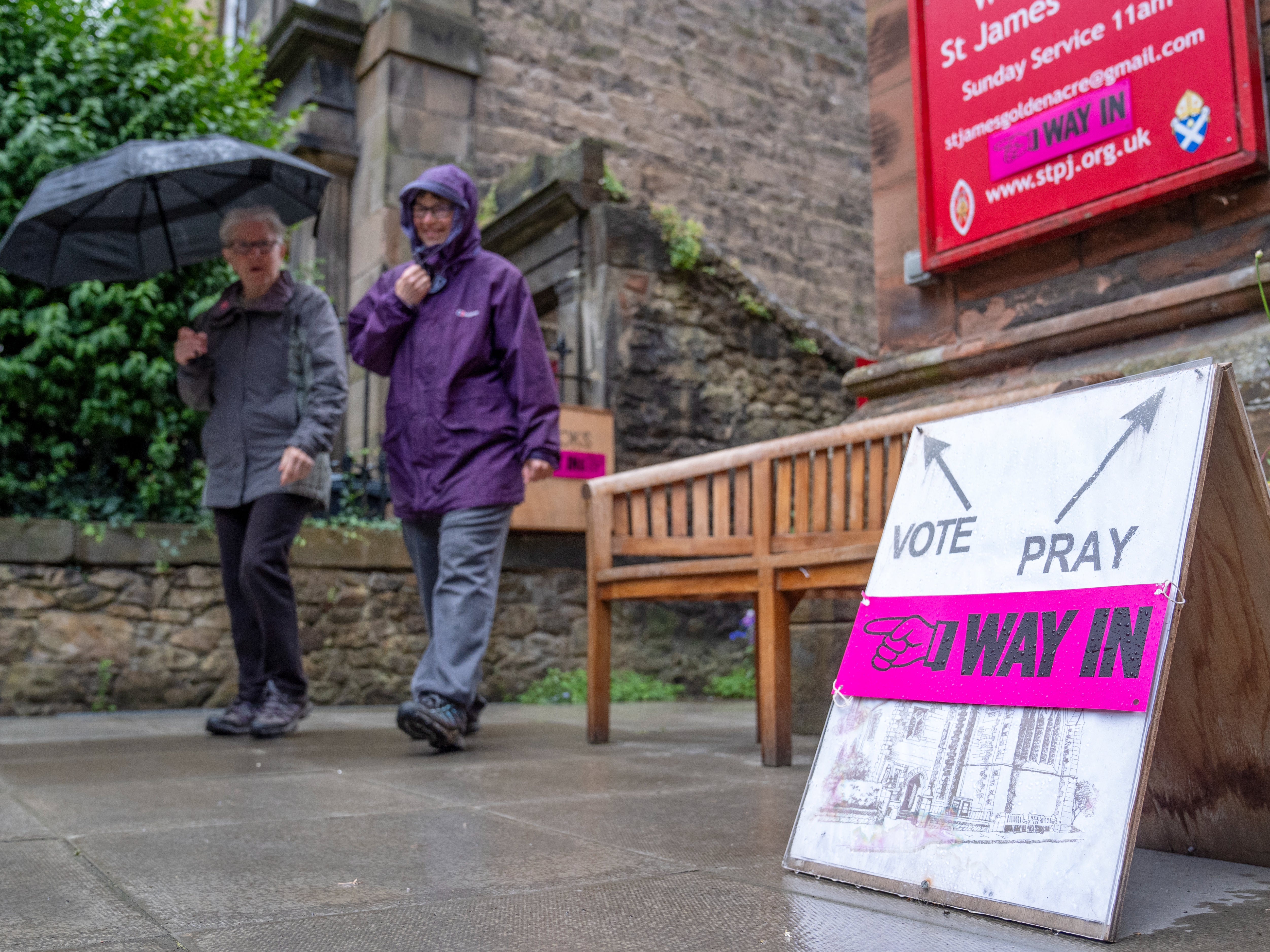 Voters in many areas faced cold and drizzle