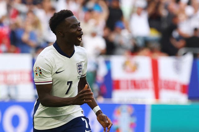 <p>Bukayo Saka celebrates after scoring England’s equaliser </p>
