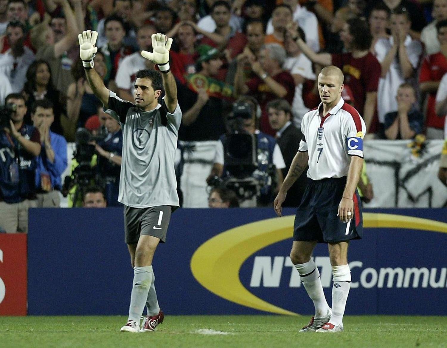 David Beckham looks dejected after missing a penalty against Portugal goalkeeper Ricardo (Nick Potts/PA)