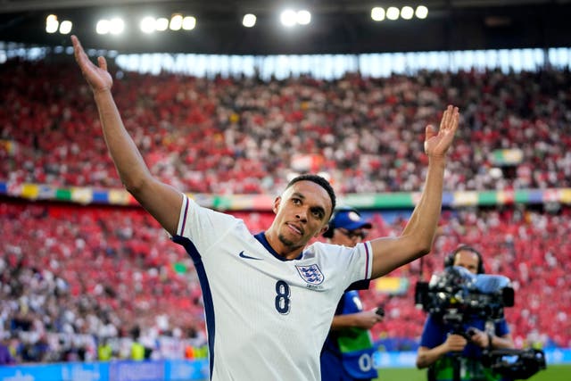 <p>Trent Alexander-Arnold celebrates in front of the England fans</p>