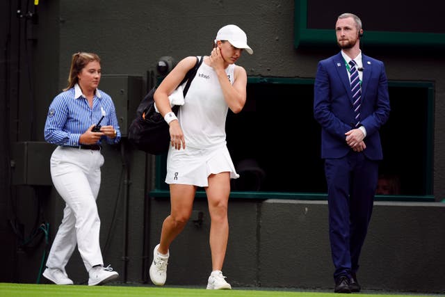 Iga Swiatek was booed back onto Court One ahead of the third set against Yulia Putintseva (Mike Egerton/PA)