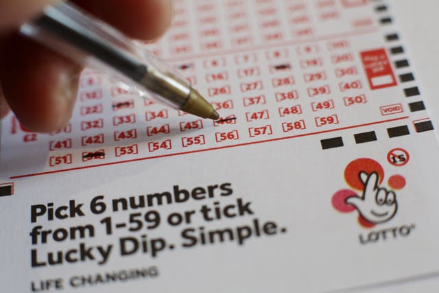 Players have been urged to check their tickets after a jackpot winner was confirmed (Yui Mok/PA)