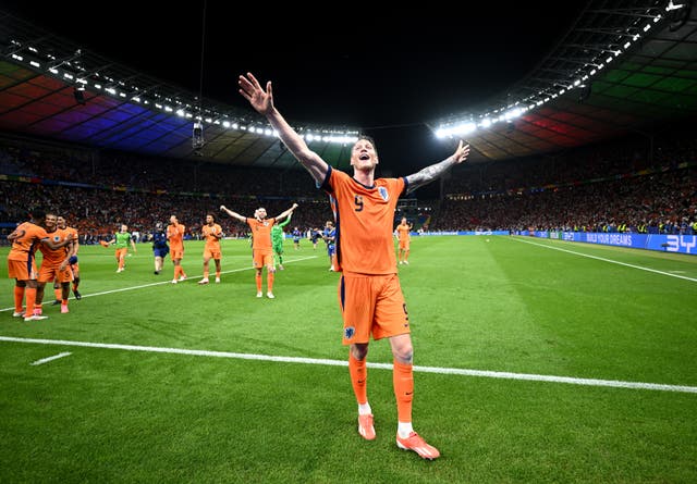 <p>Wout Weghorst celebrates after Netherlands won their quarter-final</p>