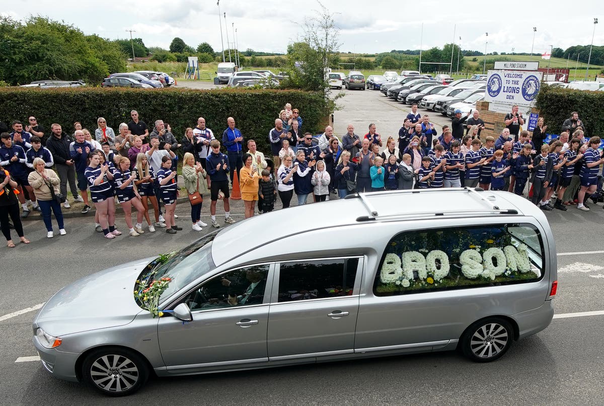 Mourners line streets to pay final respects to Rob Burrow ahead of funeral