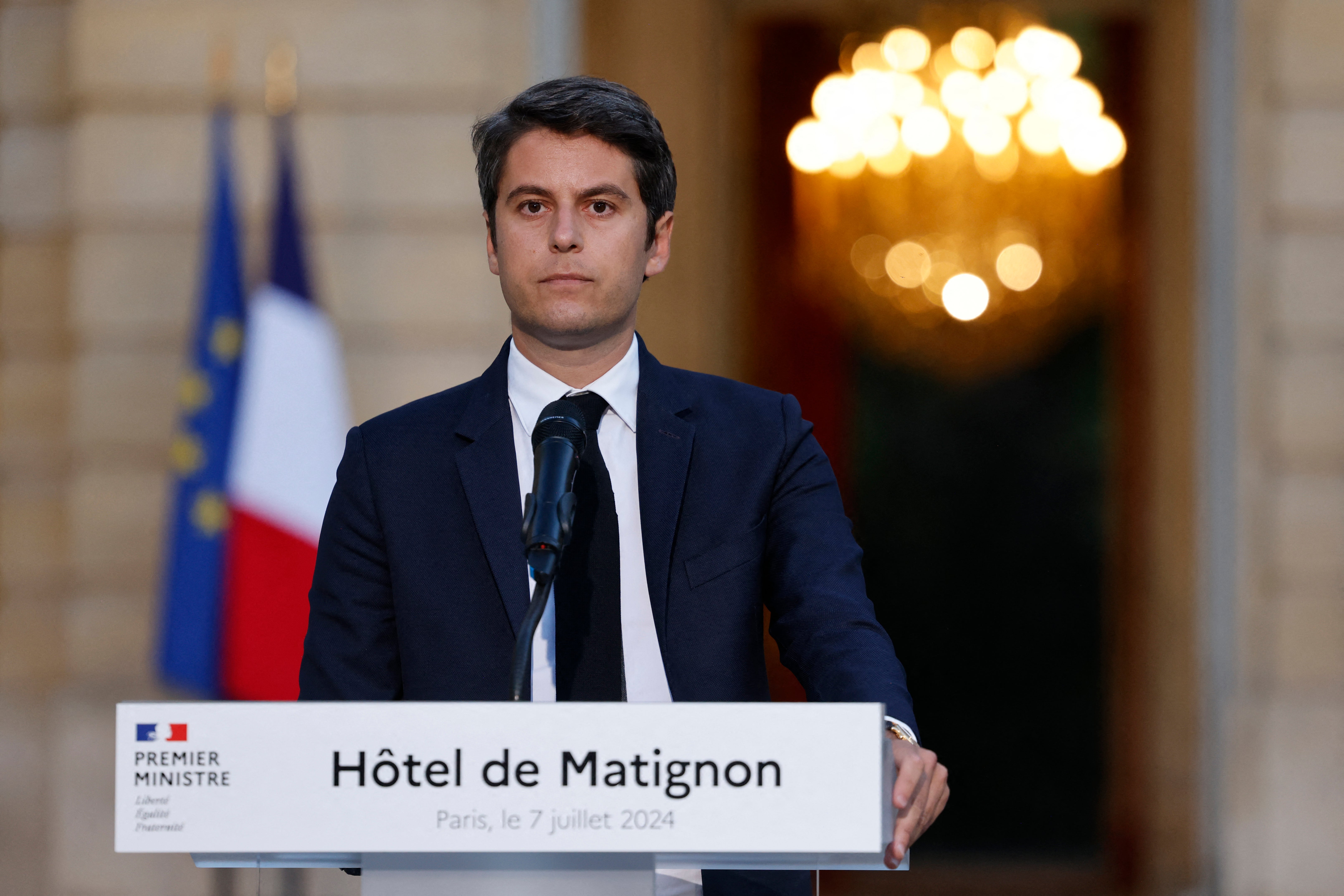 France’s prime minister Gabriel Attal gives a speech following the first results of the second round of France’s legislative election at Matignon in Paris on 7 July 202