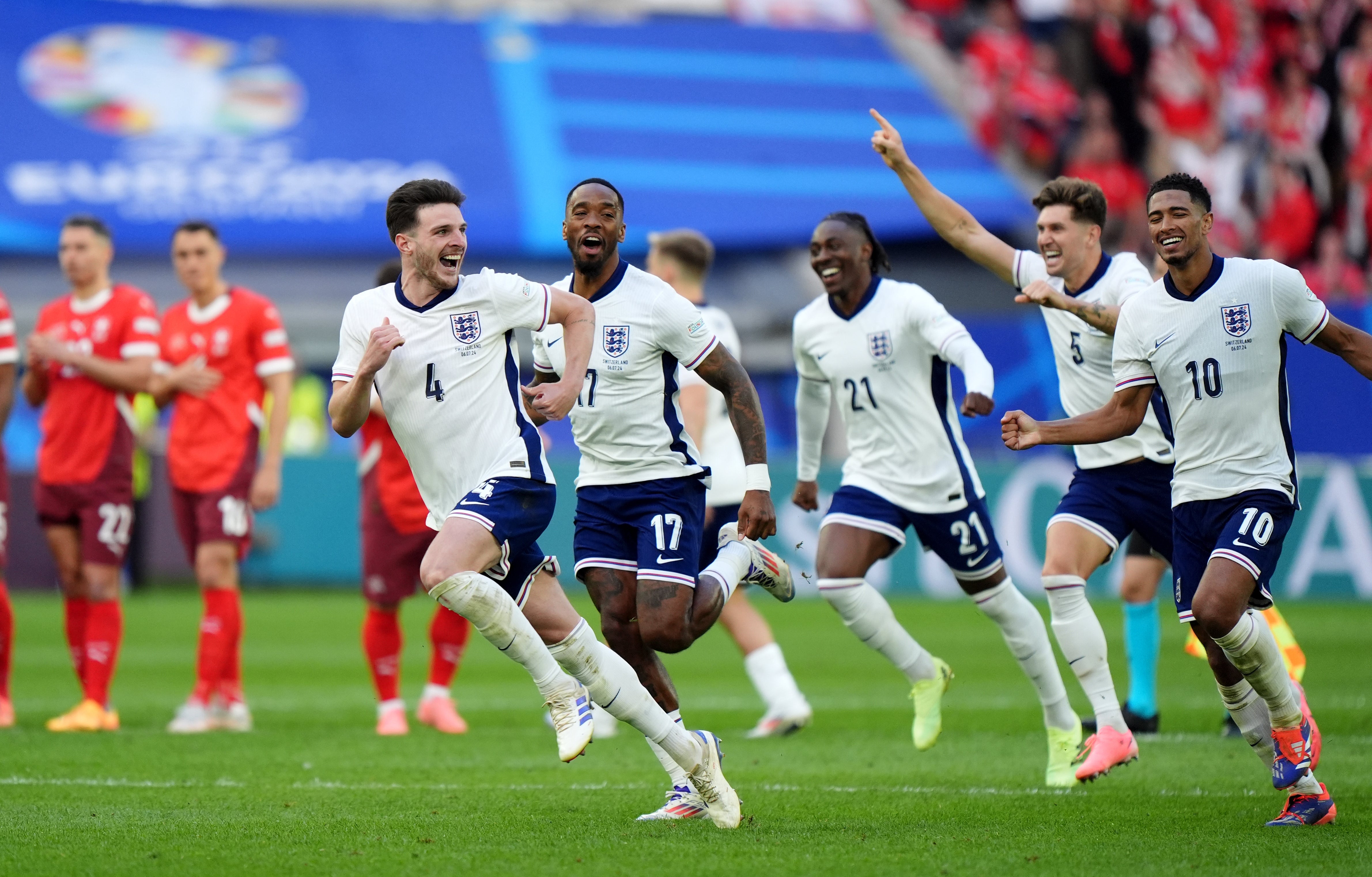 England players celebrate beating Switzerland in their quarter-final penalty shootout