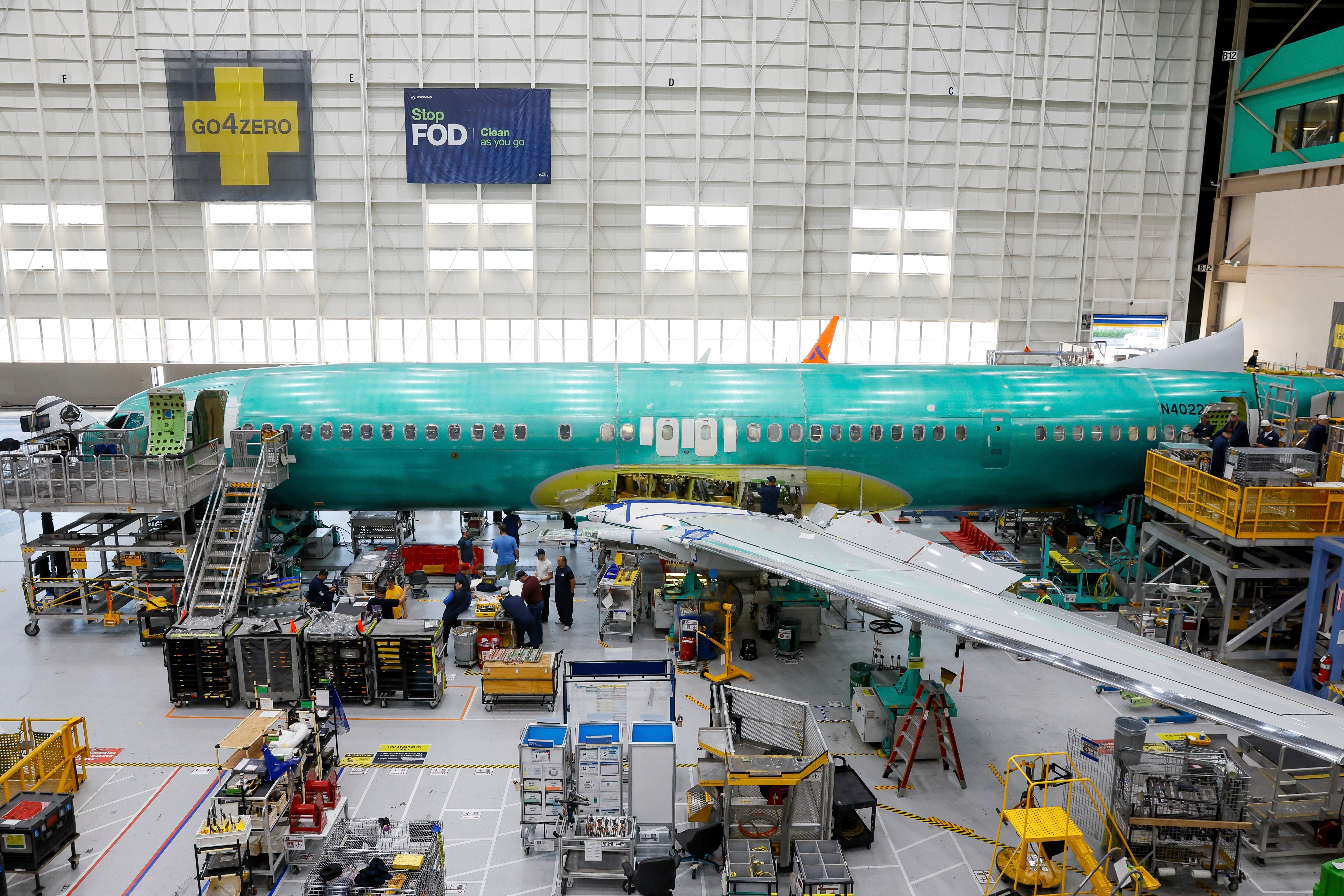 A Boeing 737 MAX aircraft is shown on the assembly line during a short media tour at Boeing's factory in Renton, Washington.