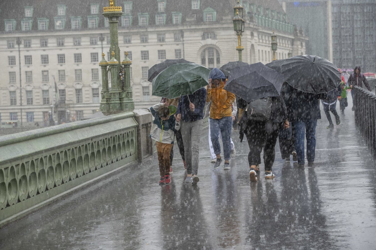 UK faces flash flooding, lightning storms and scorching heat in turbulent weekend of weather