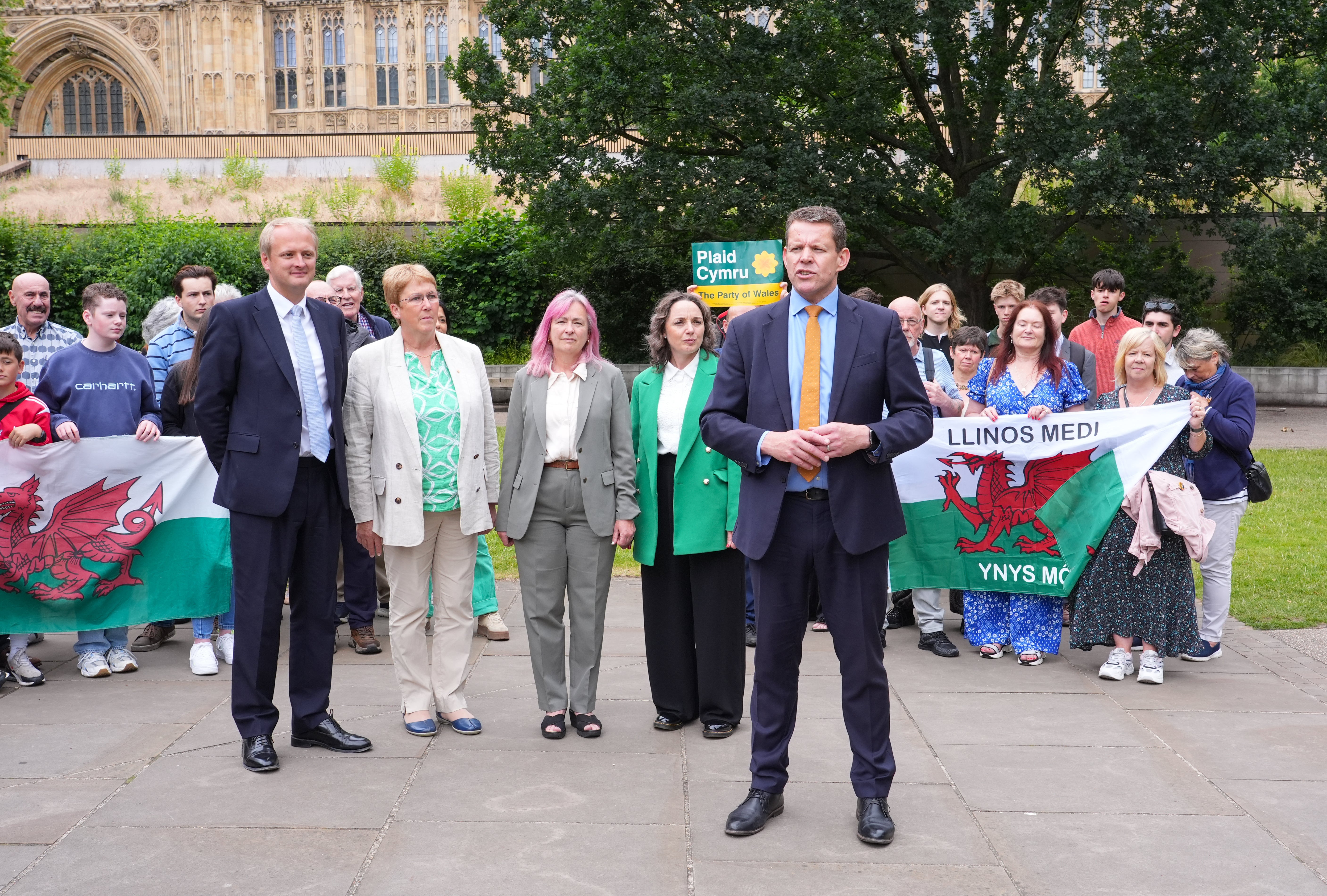 Plaid Cymru Leader Rhun ap Iorwerth (right), joins the four Plaid Cymru MPs from left, Ben Lake, Ann Davies, Liz Saville Roberts and Llinos Medi who won seats in the 2024 General Election (Ian West/PA)