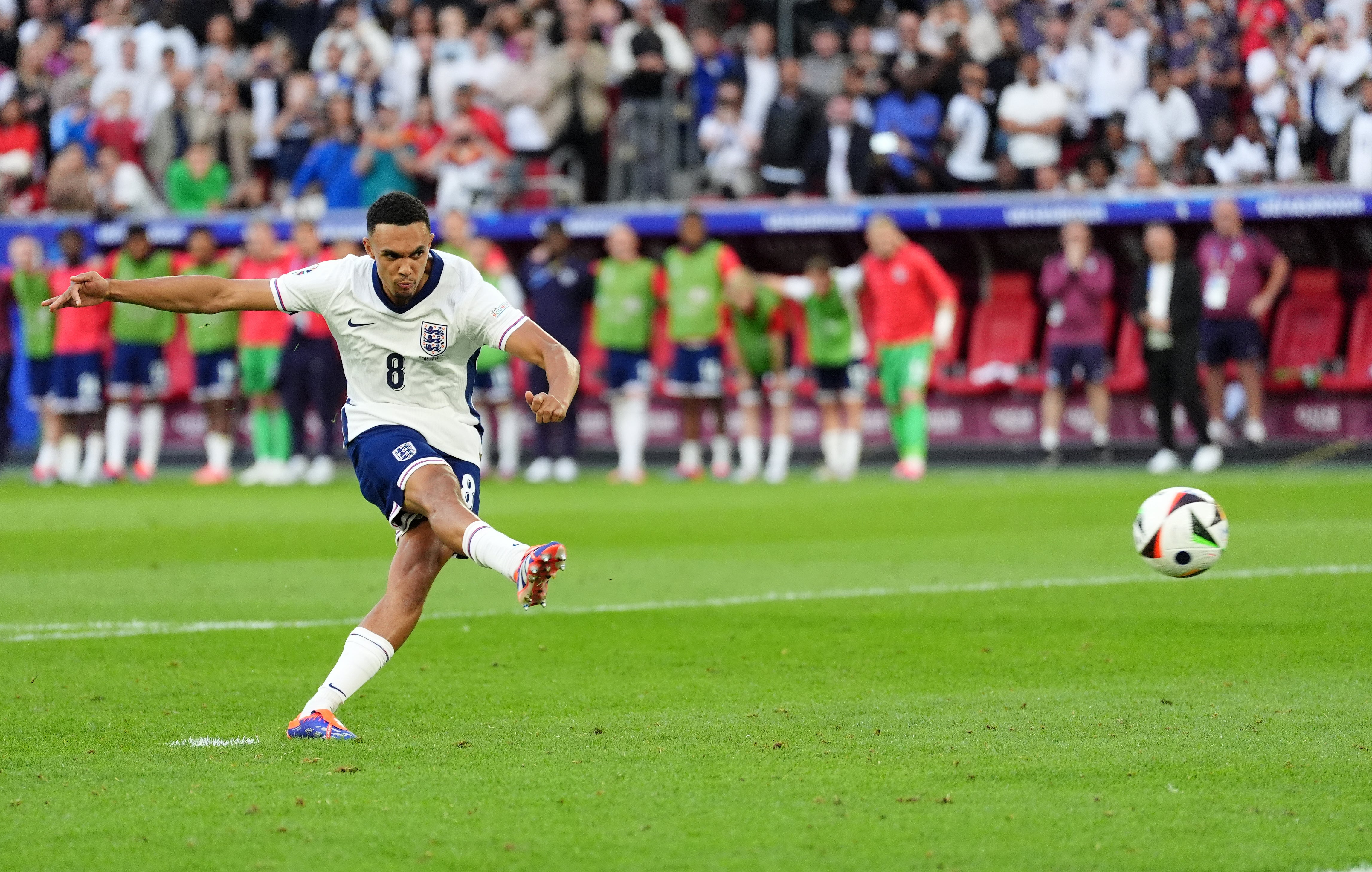 England’s Trent Alexander-Arnold scores the winning penalty in the shoot-out victory against Switzerland. (Adam Davy/PA)