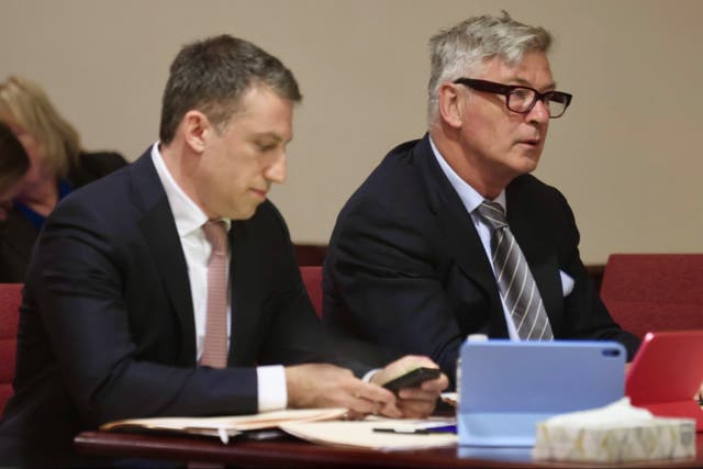 <p>Alec Baldwin appeared in court on Monday alongside his attorney Alex Spiro (left)</p>