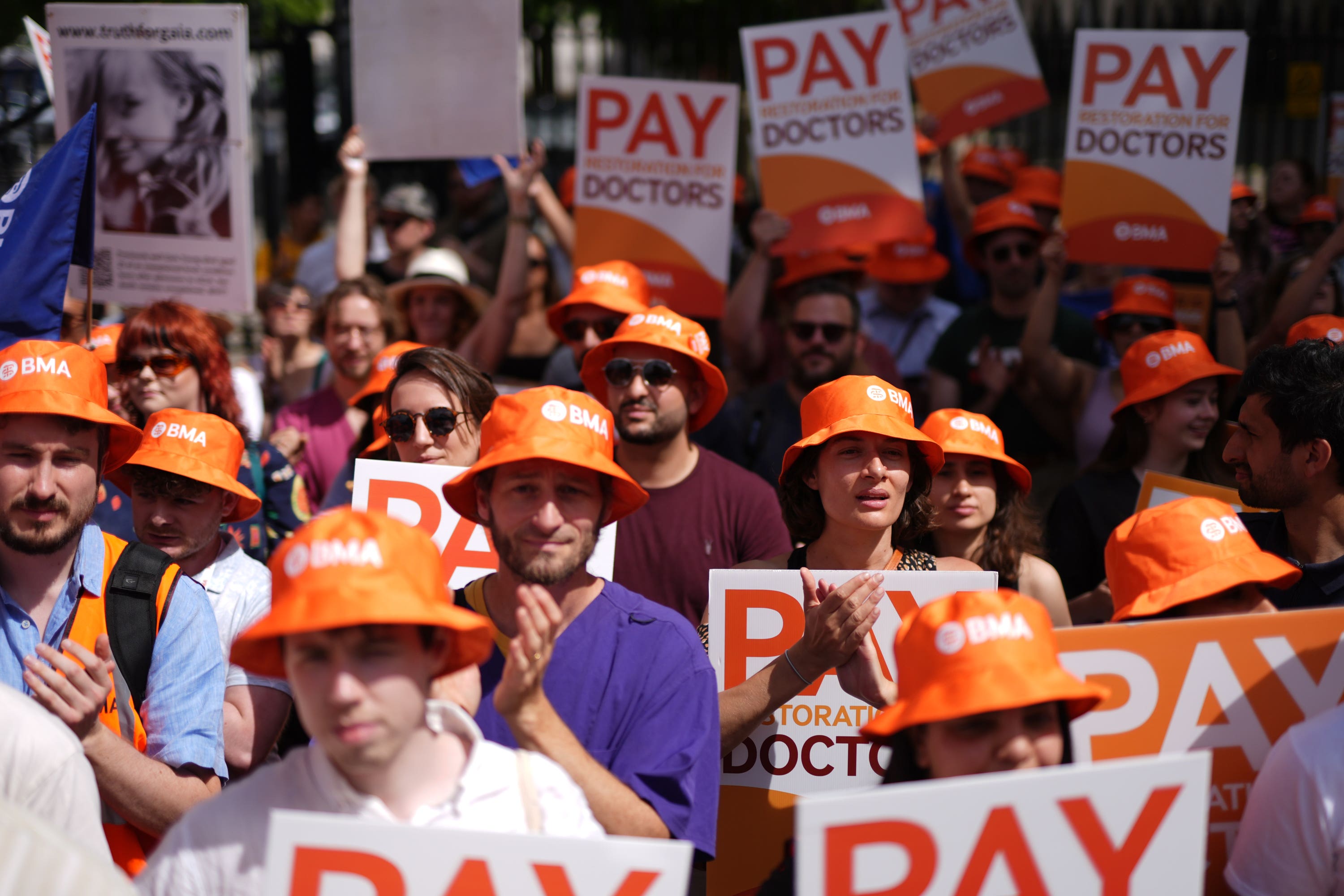 Junior doctors protest opposite Downing Street, London, in June during their continuing dispute over pay (Jordan Pettitt/PA)