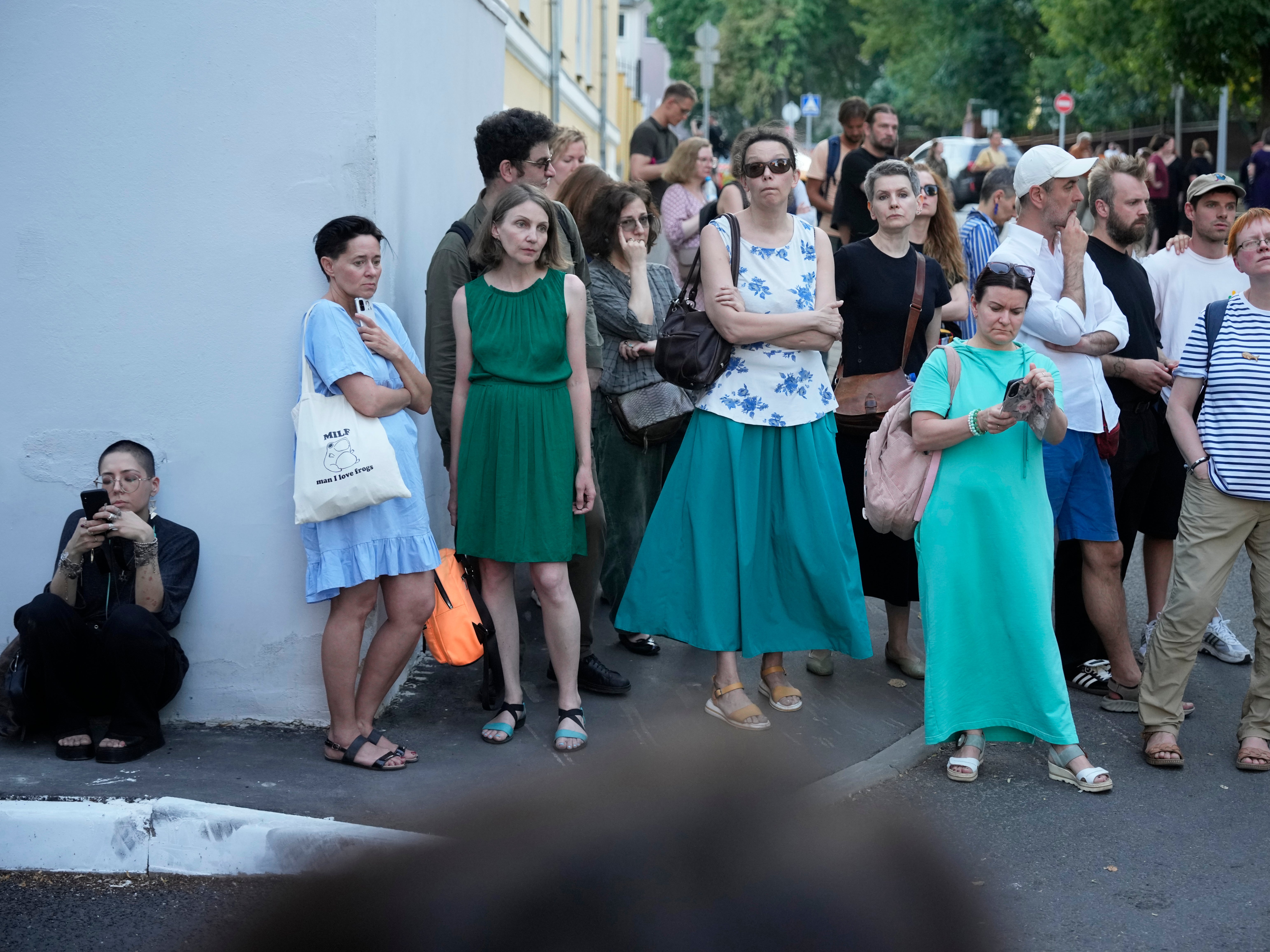 People stand outside a Moscow court that sentenced Yevgenia Berkovich and Svetlana Petriychuk on 8 July 2024