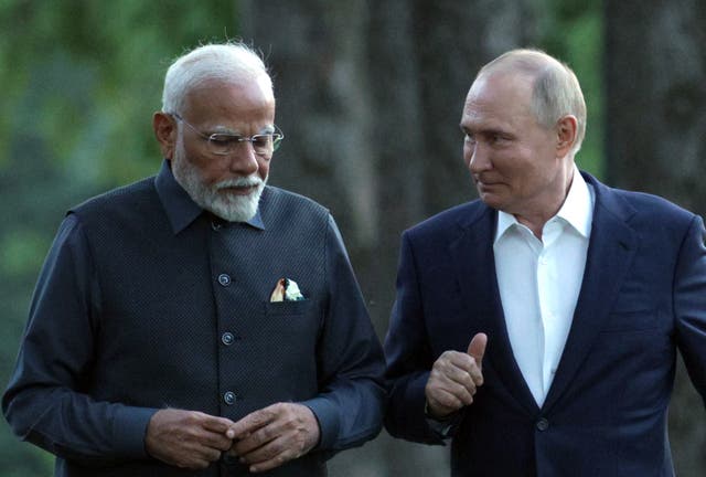<p>Narendra Modi with Vladimir Putin at the Novo-Ogaryovo state residence outside Moscow</p>