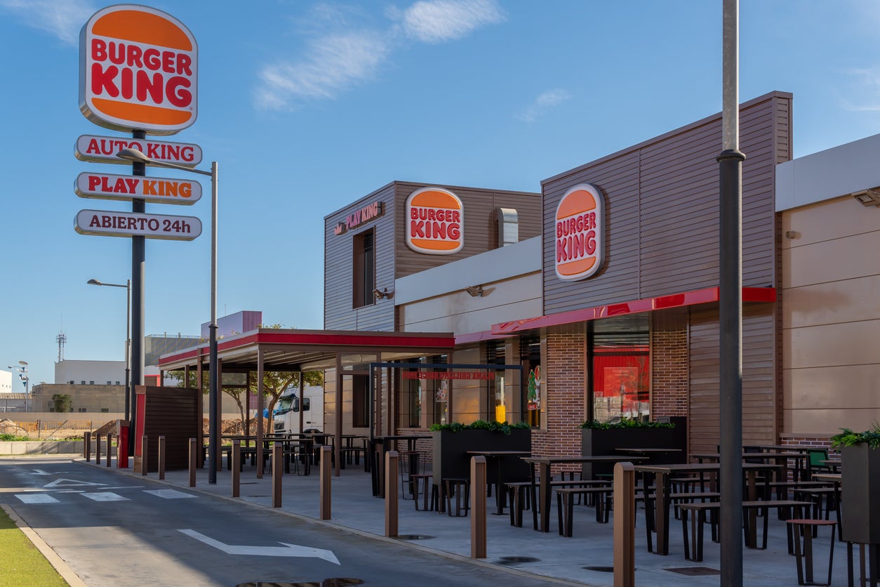 The holidaymakers traded ‘whopper’ accommodation costs for Burger King’s signature stack