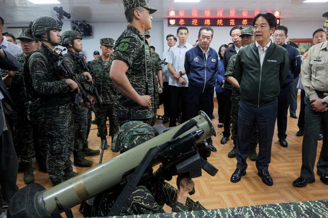 <p>File. Taiwanese president Lai Ching-te looks at a rocket launcher during his visit to a military camp in Taoyuan</p>