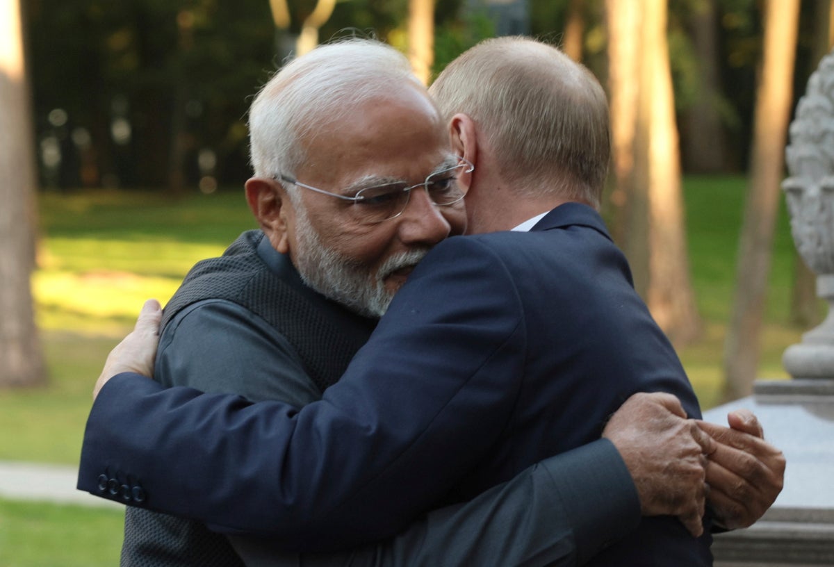 Modi under fire for bear-hugging ‘mass murderer’ Putin during Moscow summit