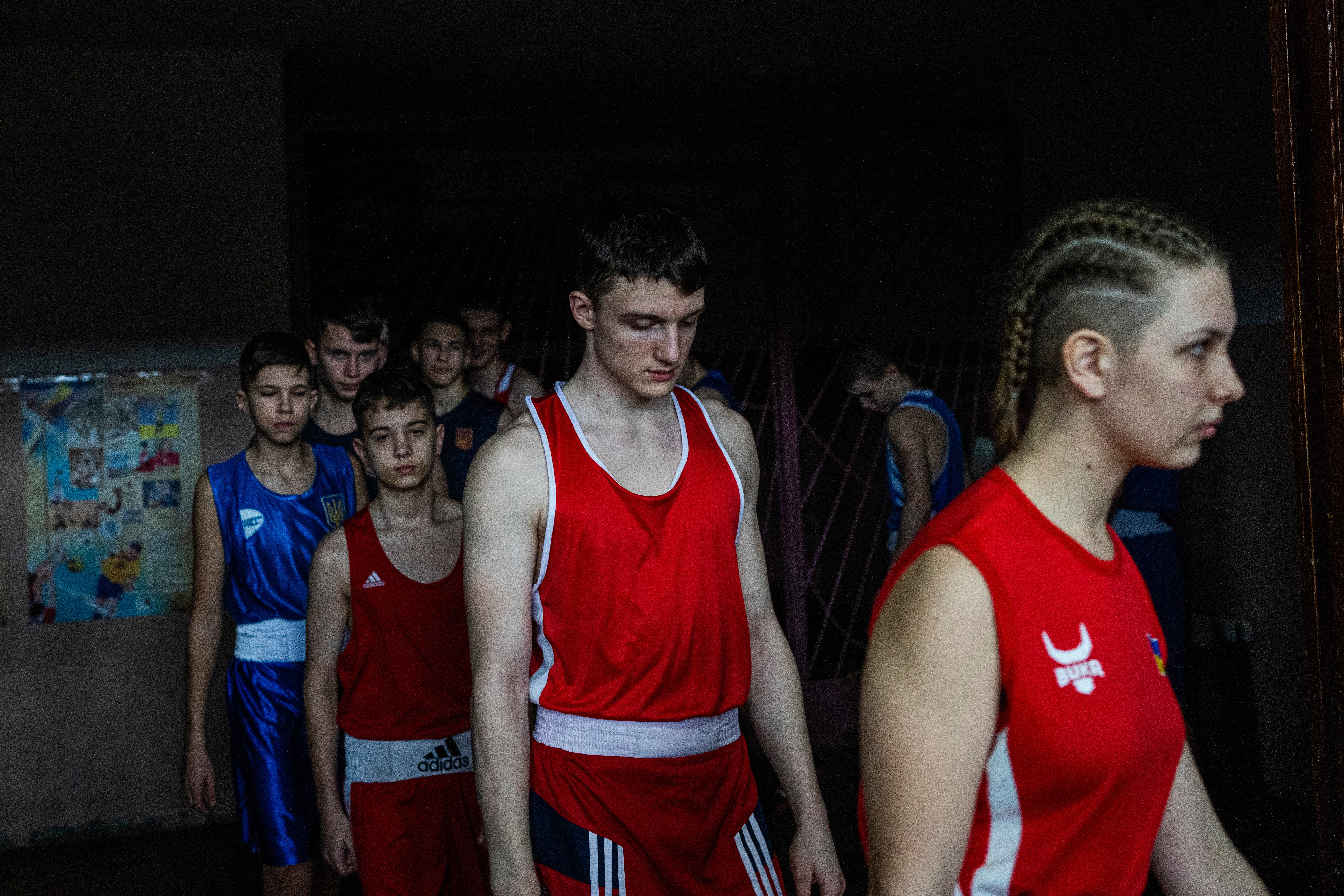 Young boxers enter the opening ceremony of a boxing tournament in honor of Maksym Halinichev