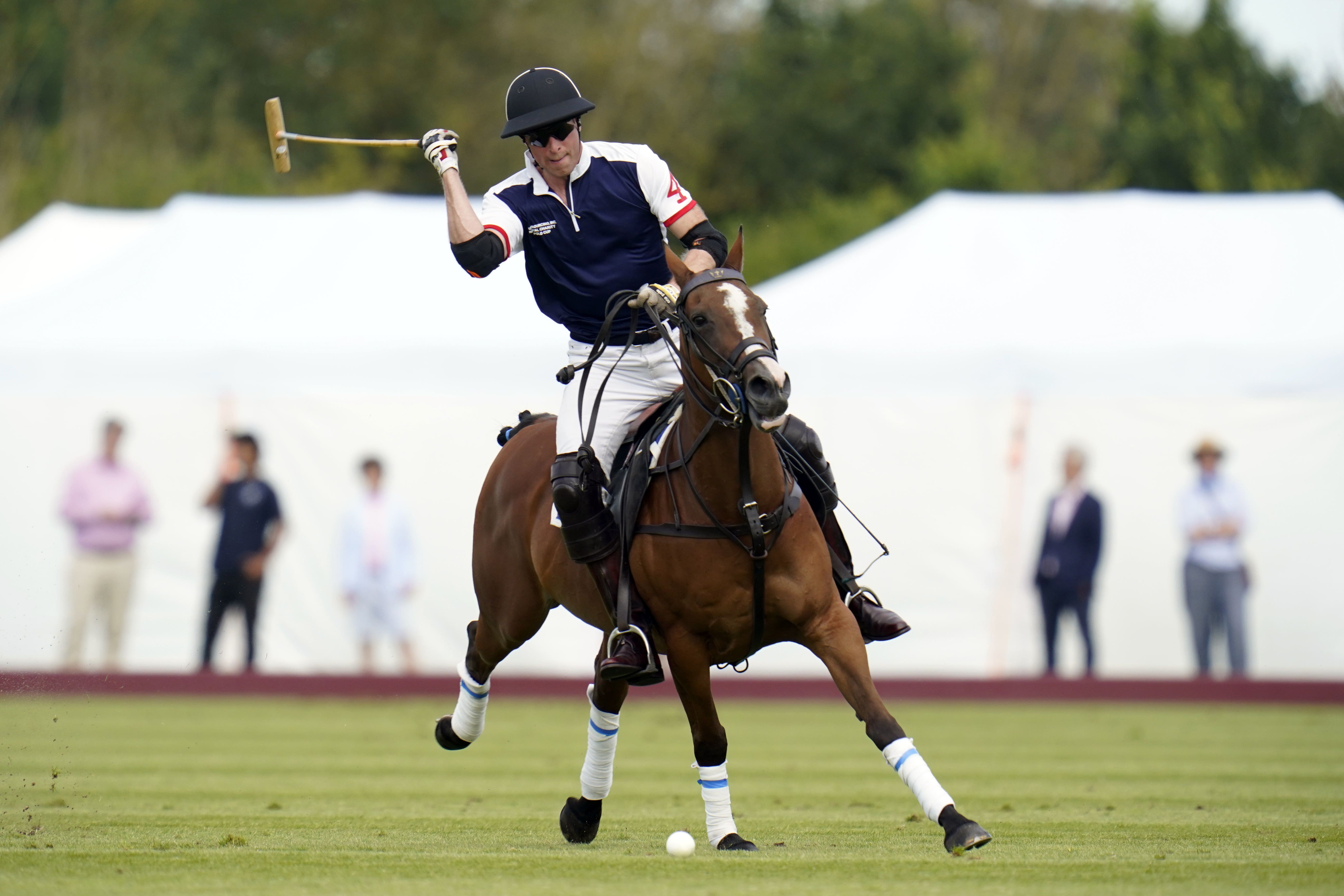 The Prince of Wales in action during the Out-Sourcing Inc Royal Charity Polo Cup 2023 at Guards Polo Club, Windsor in 2023 (Andrew Matthews/PA)