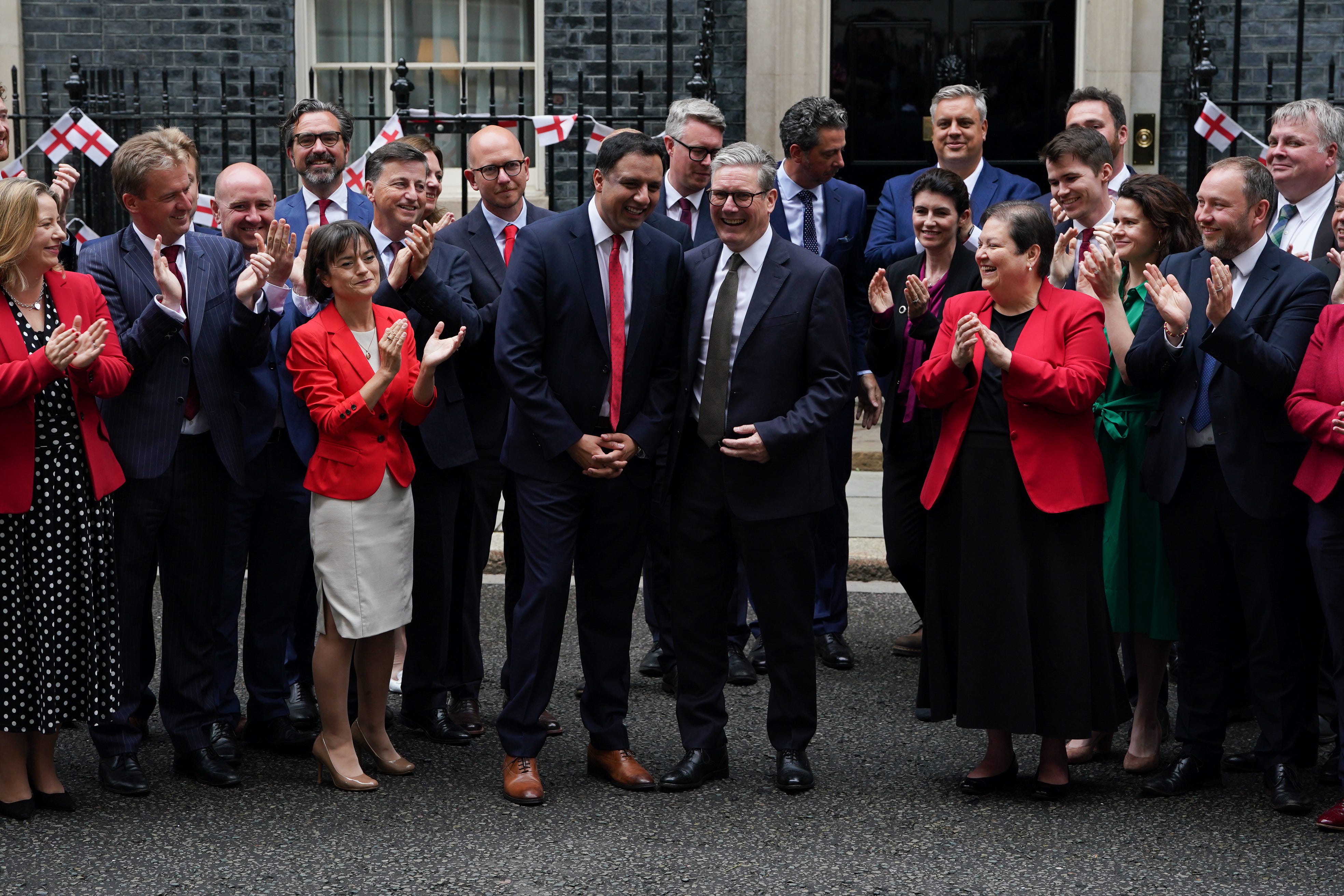 The Prime Minister posed with his Scottish MPs on Tuesday (Lucy North/PA)