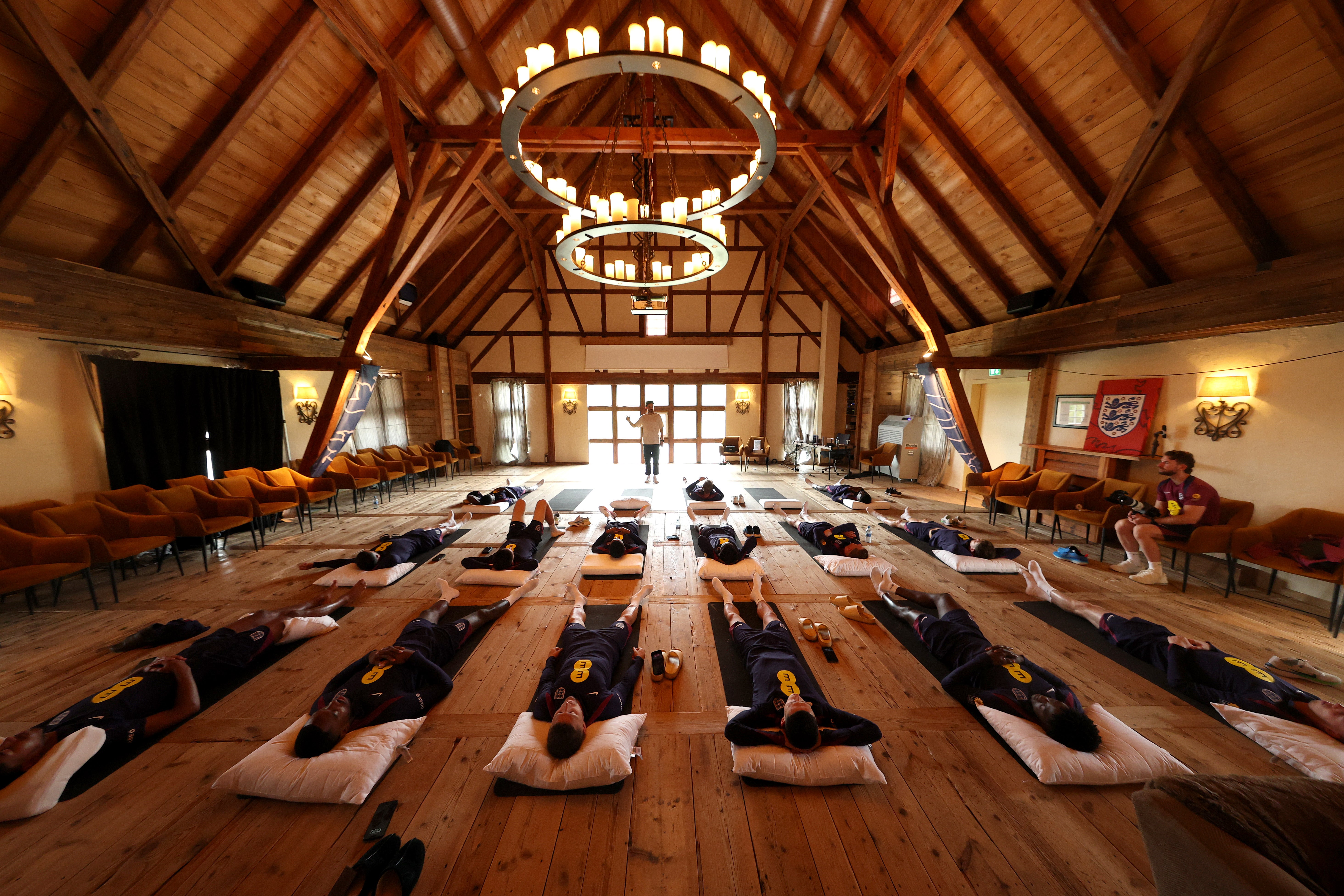 Stuart Sandeman conducts a breathwork recovery session with the England squad