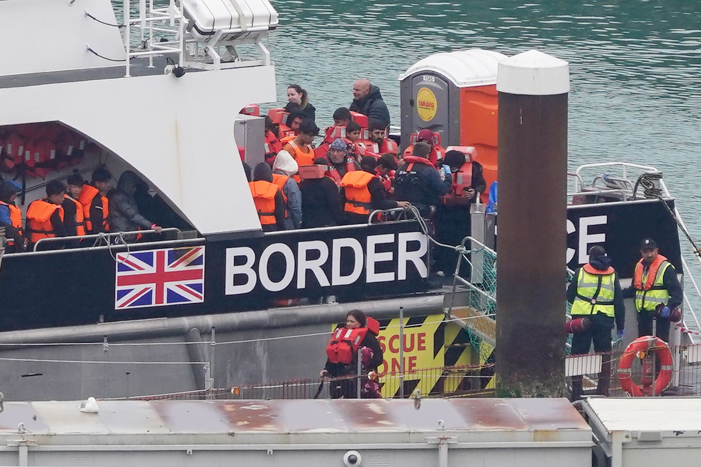 A group of people thought to be migrants are brought in to Dover (Gareth Fuller/PA)