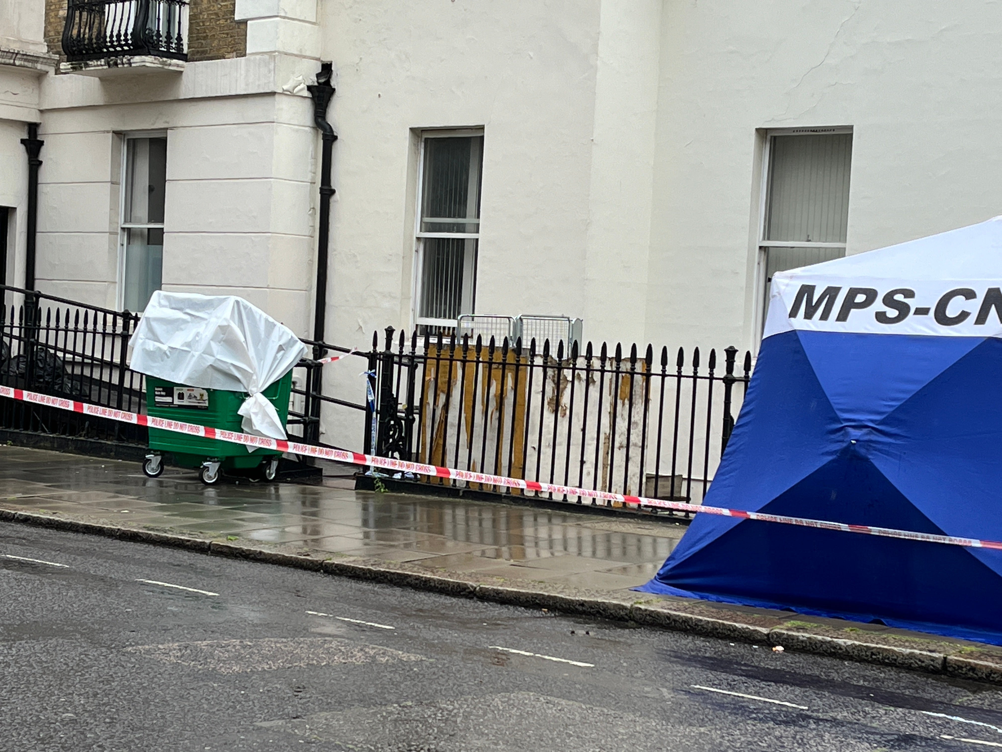 A bin used by builders has been sealed off by forensics