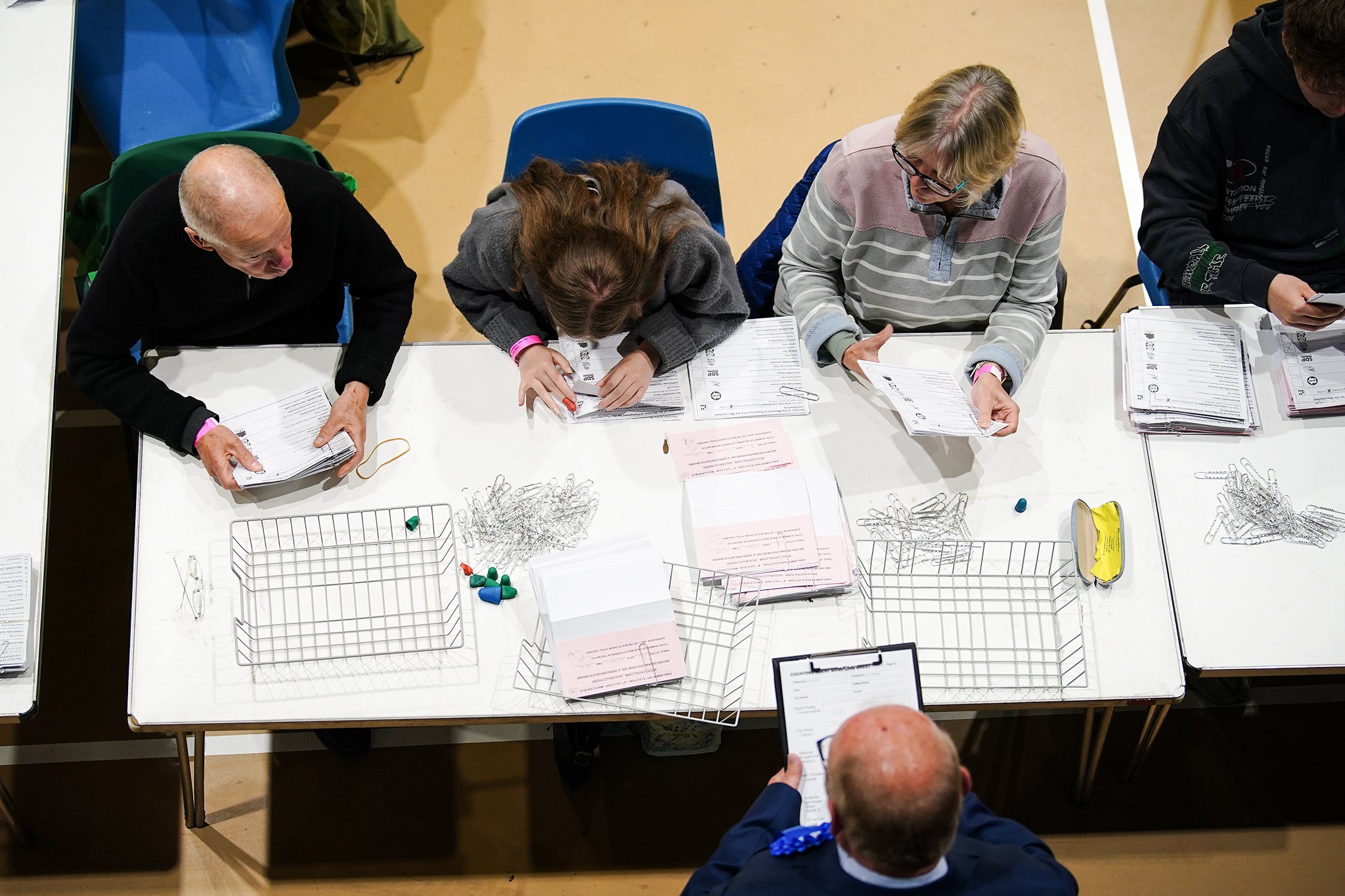 Ballots are sorted at Macclesfield Leisure Centre, in Cheshire, after polls closed last week