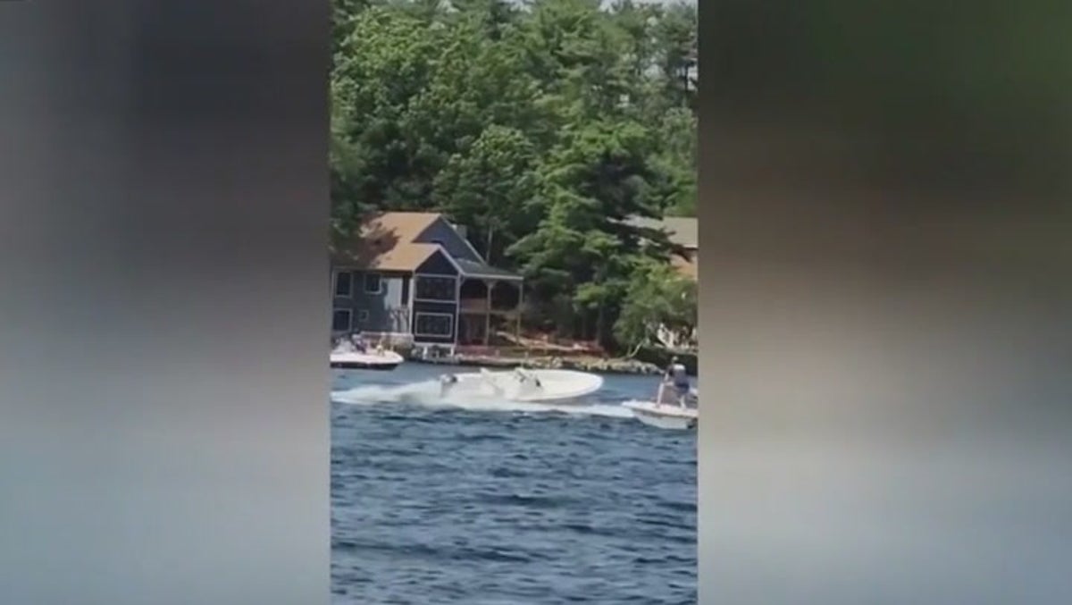 Moment teenager jumps from jet ski to stop runaway boat after instructor falls overboard