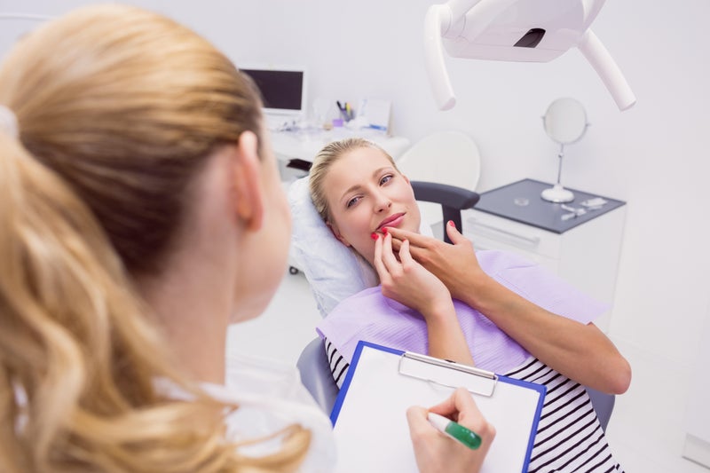 Woman describes pulling her own teeth after seven-year wait for dentist