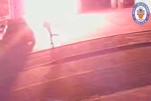 West Midlands Police have released CCTV showing an offender starting a fatal fire in Wolverhampton and running away after almost being engulfed in flames (West Midlands Police/PA)