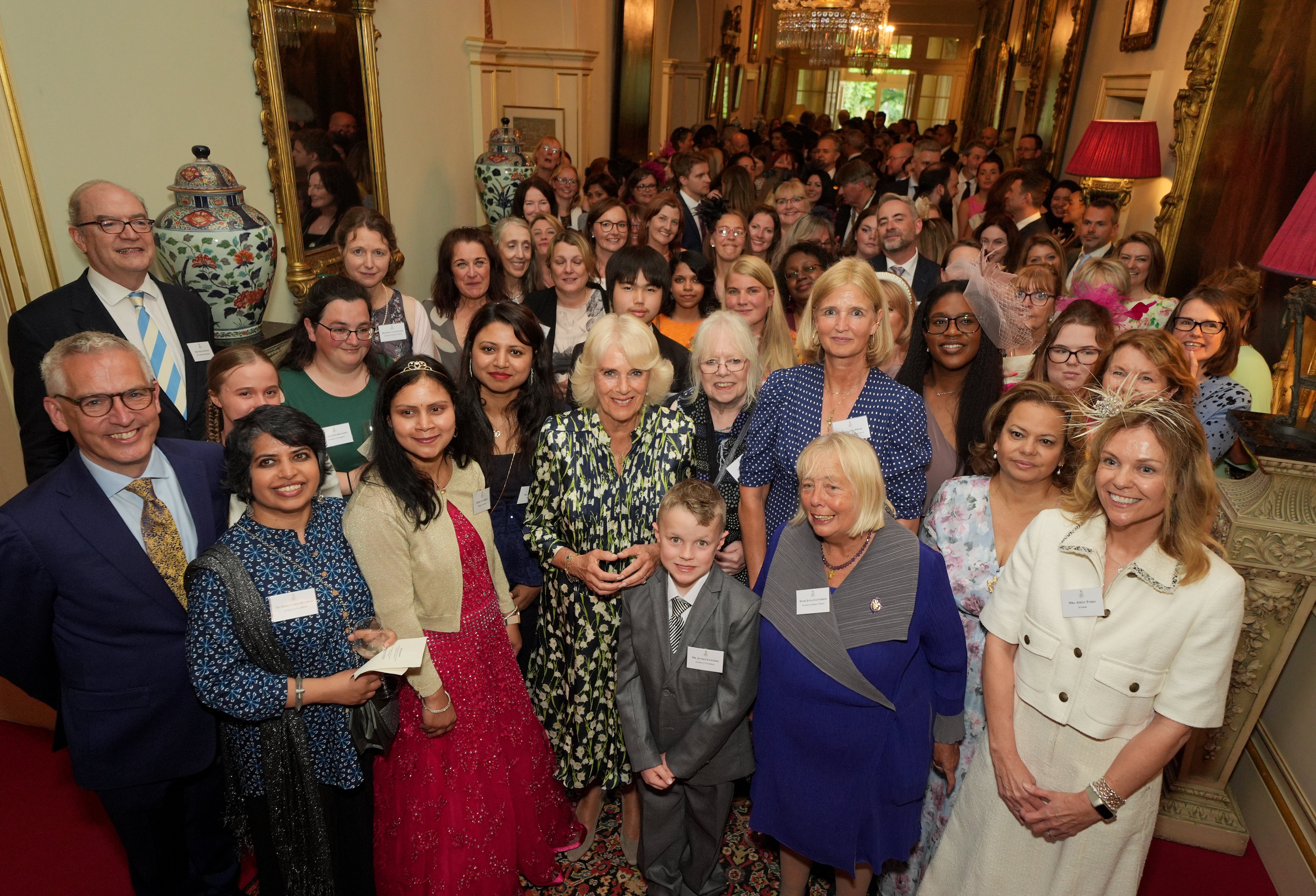 The Queen hosted community volunteers and authors at Clarence House in central London (Yui Mok/PA)