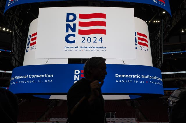 <p>The logo for the Democratic National Convention is displayed on the scoreboard at the United Center during a media walkthrough on January 18, 2024 in Chicago, Illinois. </p>