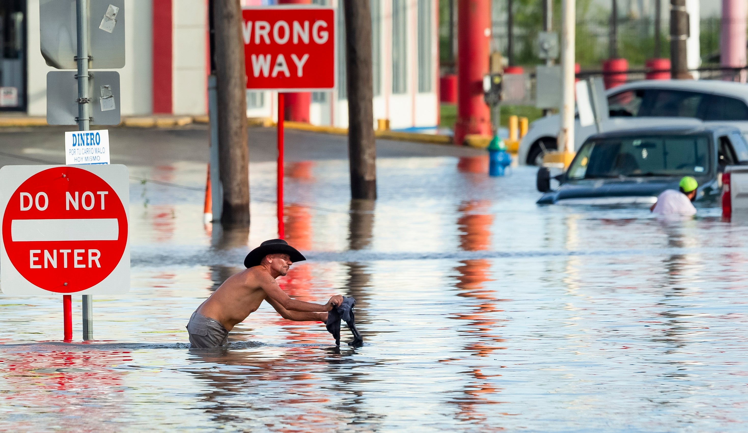 <p> A man navigates flood waters following heavy rain from Hurricane Beryl in Houston, Texas, USA, 08 July 2024</p>