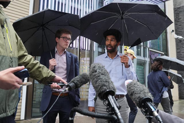 Dr Vivek Trivedi, right, and Dr Robert Laurenson, co-chairmen of the BMA’s junior doctors committee, hailed a ‘positive first step’ towards ending their long-running dispute over pay (Lucy North/PA)