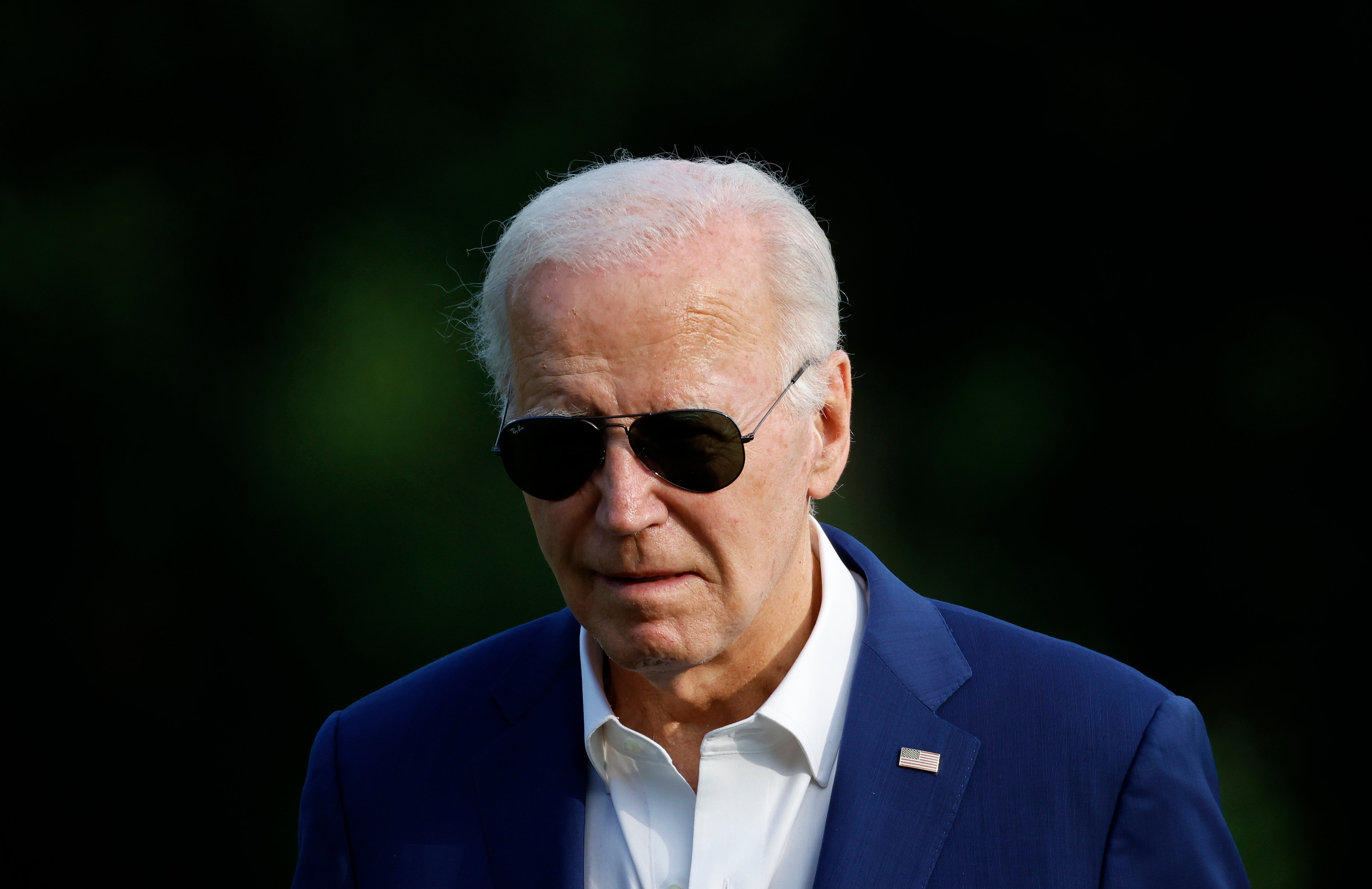 U.S. President Joe Biden returns to the White House with first lady Jill Biden on July 7, 2024, in Washington, DC. A junior navy sailor tried to get ahold of his medical records three times in February.