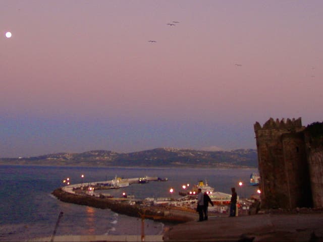 <p>Moonrise over the harbour at Tangier in Morocco, where Ryanair has opened a base</p>