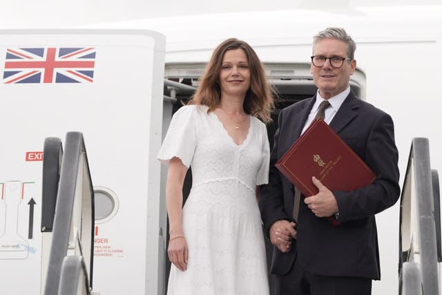 <p>Prime Minister Sir Keir Starmer and his wife Victoria arrive in Washington for the Nato summit(Stefan Rousseau/PA)</p>