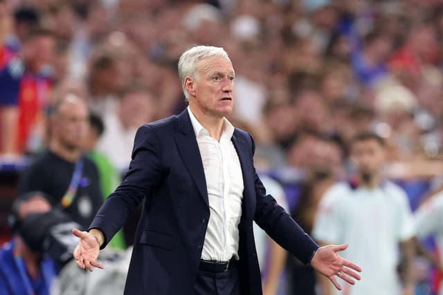 <p>Didier Deschamps watches on as his France side lose to Spain</p>