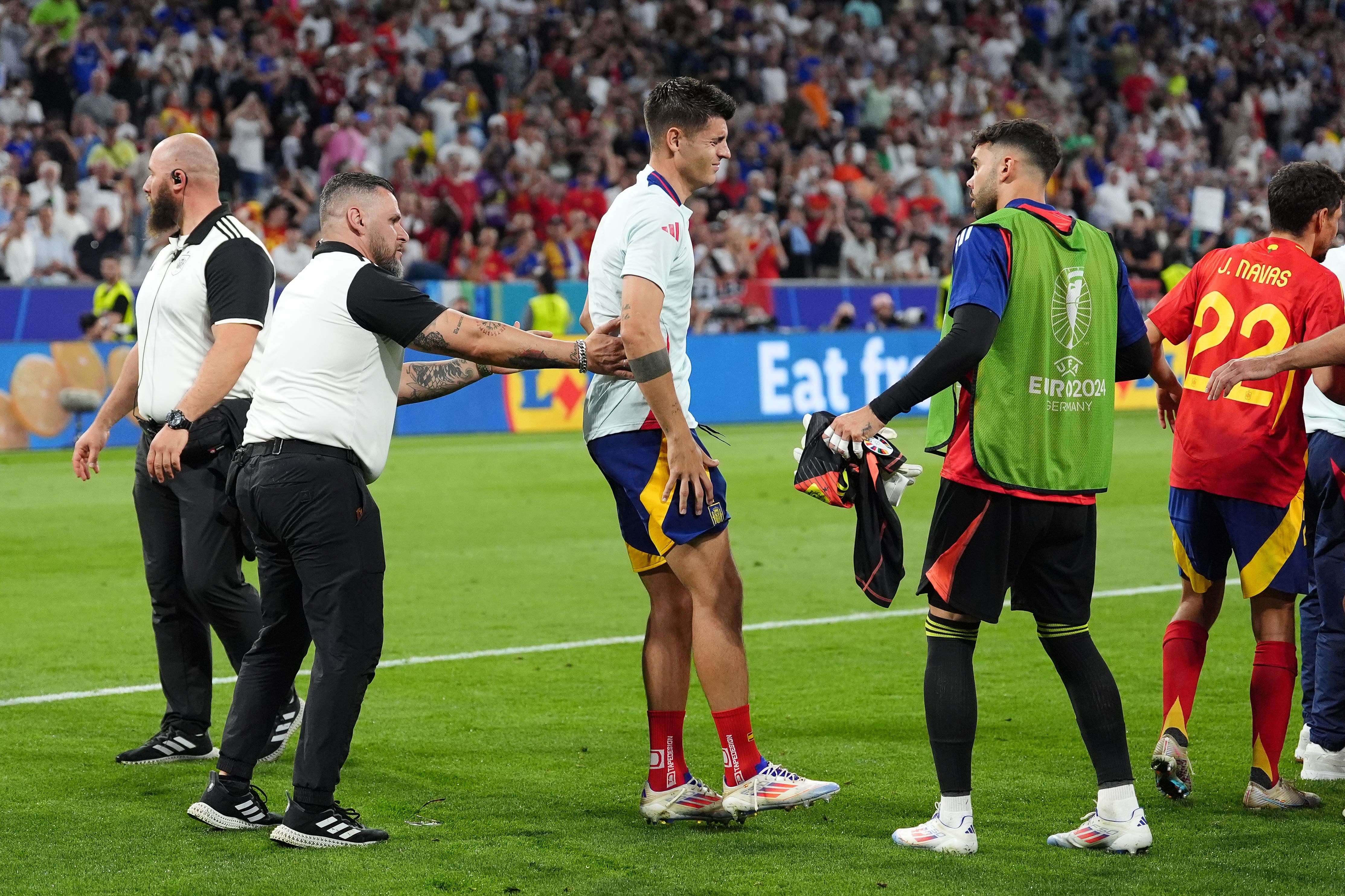 Spain captain Alvaro Morata, centre, reacts after being involved in a collision with stadium security following their Euro 2024 semi-final victory over France (Bradley Collyer/PA)