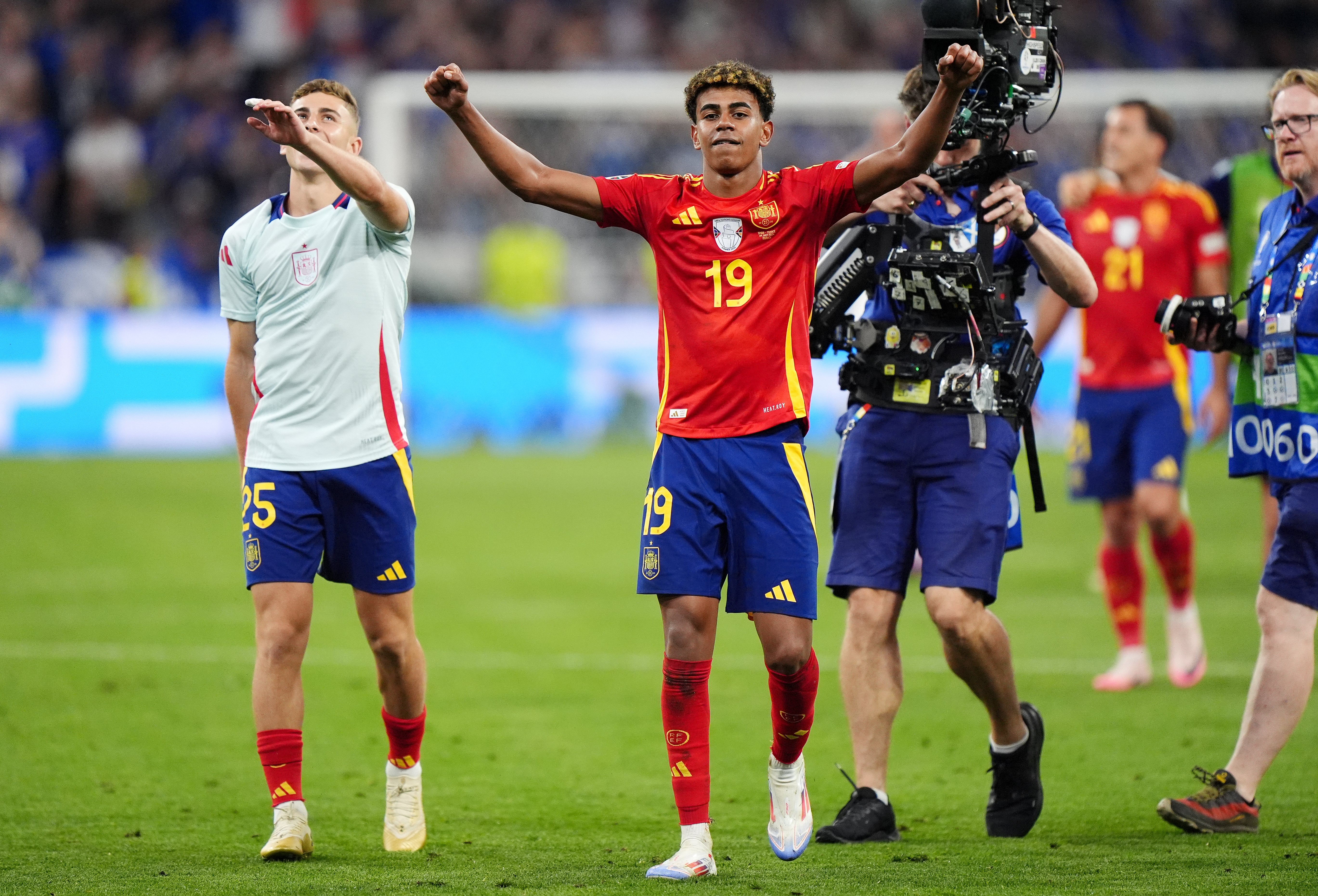 Lamine Yamal (centre) celebrates Spain’s victory over France after becoming the youngest scorer in European Championship history (Bradley Collyer/PA)