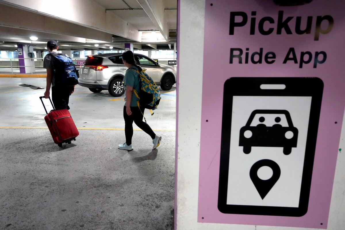 https://static.independent.co.uk/2024/07/10/05/Uber_Lyft_Union_Rights_93655.jpg?width=1200&height=800&crop=1200:800