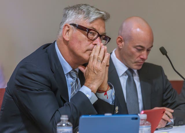 <p>Actor Alec Baldwin, left, sits with his lawyer Luke Nikas, in District Court in Santa Fe</p>