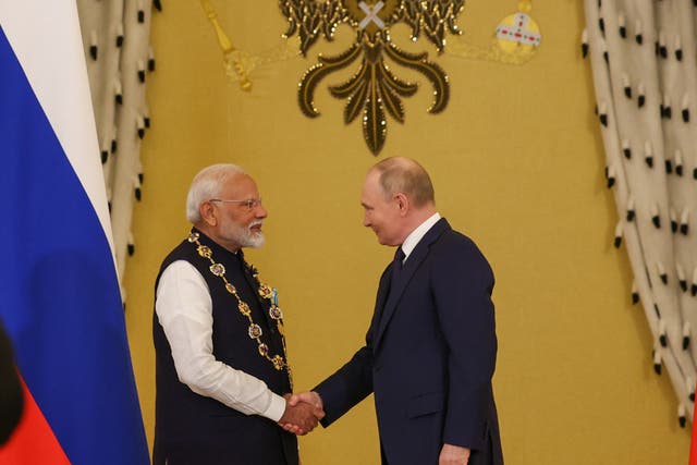 <p>Narendra Modi with Vladimir Putin in Moscow </p>