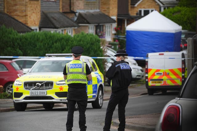 Police at the scene in Ashlyn Close, Bushey, Hertfordshire, where three women were killed (James Manning/PA)