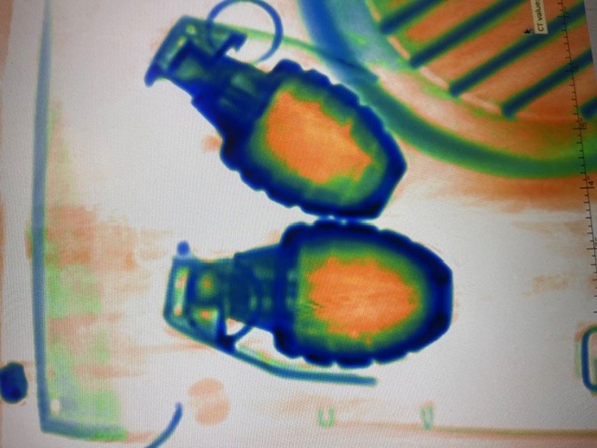 Airport evacuated after two grenades spotted in man’s carry-on bag during scan